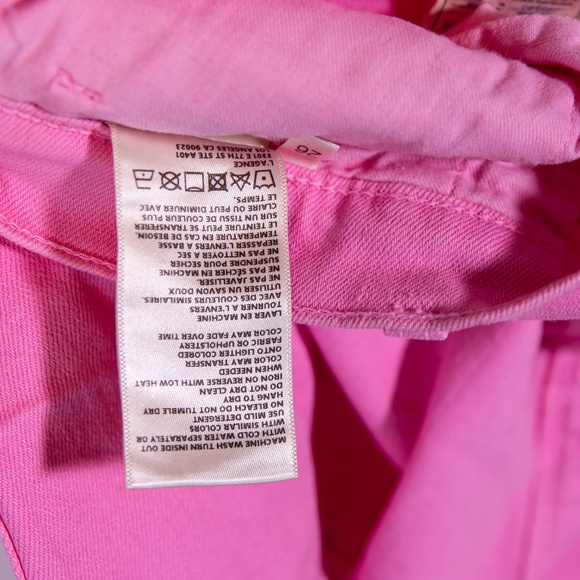 L'Agence Women's Audrey Cotton Stretch Mid Waist Cut Off Denim Shorts Rose Bloom - Picture 3 of 4